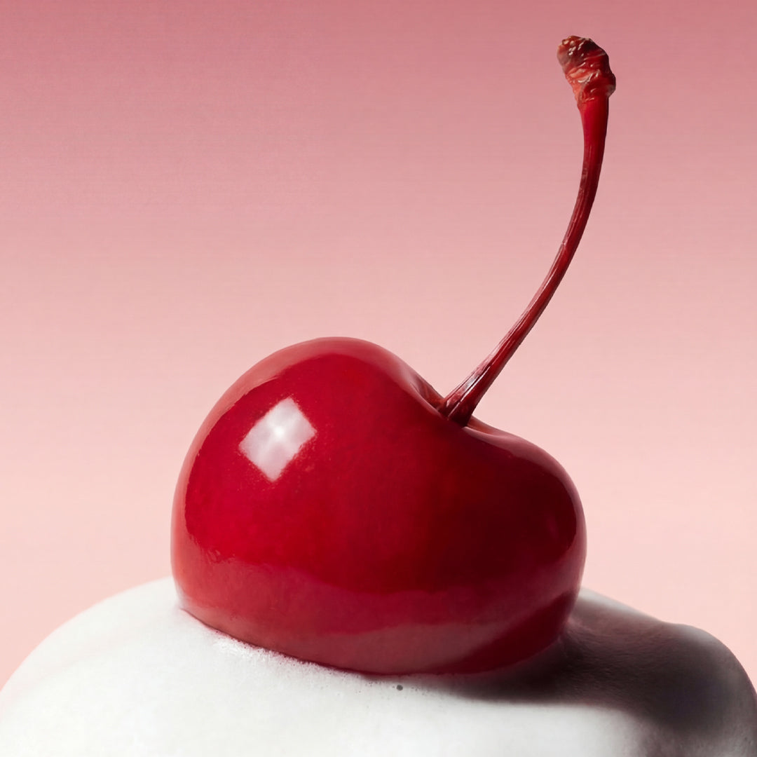 Glossy red cherry resting on whipped cream foam, Whippy Black Cherry & Coconut Milk scent